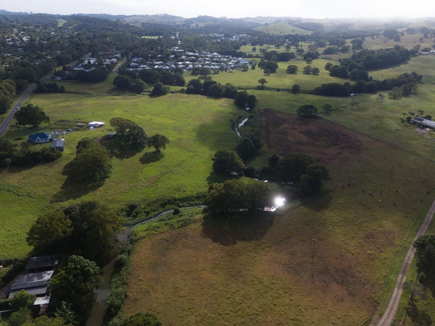 the wider aerial, all rolling green