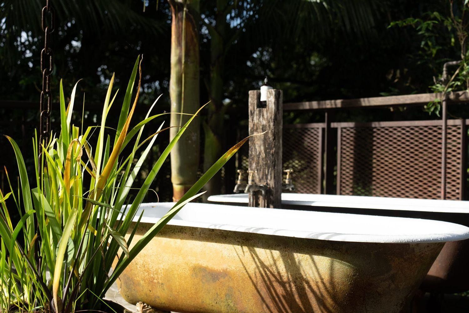 the baths on the barn deck, steam in the trees